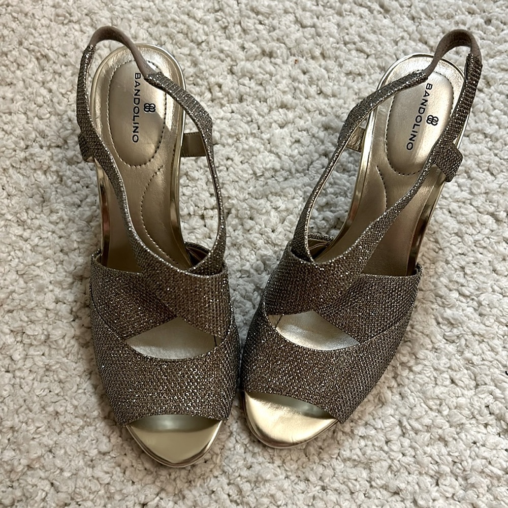 ACCEPTING OFFERS! Brand new, never worn silver Bandolino 2 inch heels; size 7.5
